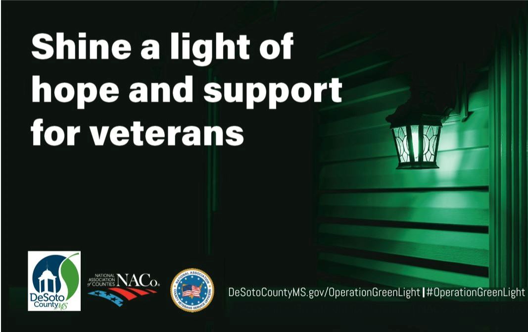 Green light bulb outside of house