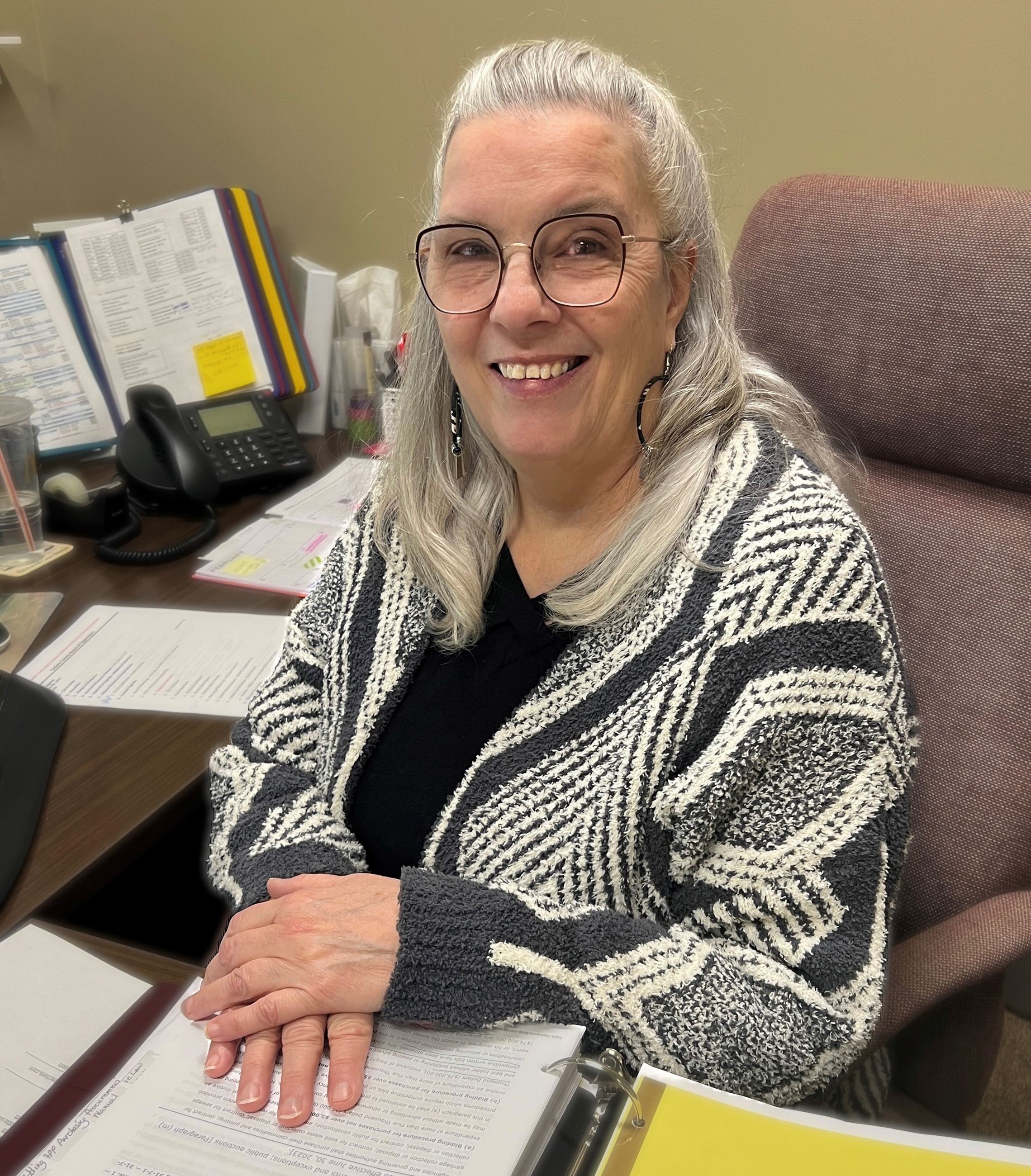 Lynn Ford at her desk
